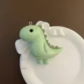 Joli porte-clés pendentif dinosaure vert pour sacs, clés de voiture et cadeau créatif quotidien. - Vert 1