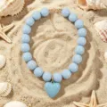 Collier ras de cou perles acrylique bleu clair pendentif coeur style bohème chic - Bleu ciel
