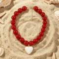 Red acrylic beaded necklace with white heart pendant variant, perfect for summer beach wear. - Red