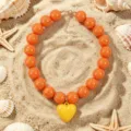 Collier de perles en acrylique orange bohème avec pendentif cœur jaune bijoux de plage - Orange