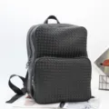 Black woven leather backpack for men and women, stylish large capacity travel laptop bag. - Black