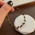 Collana girocollo con pietre naturali intrecciate stile francese design di lusso elegante. - 04M-1 Braccialetto in Pietra Occhio di Tigre e Acciaio al Titanio