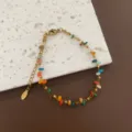 Collana a strati intrecciata in pietra naturale francese con perline colorate e dettagli metallici. - 04M-1 Braccialetto in Pietra Colorata e Acciaio al Titanio Variante 2