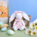 Easter bunny plush toy with cute floral dress, perfect for spring holiday home decor. - Pink