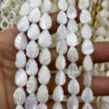 White mother of pearl carved leaf shaped beads for DIY handmade jewelry making and crafts. - 8X12mm / White