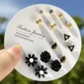 Elegantes Ohrringset in Schwarz und Gold mit schönen floralen und geometrischen Motiven. - Schwarz Stilset (EZ5858)