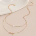 Exquisites zweilagiges Goldhalsband Detailfoto mit Perlenanhänger, Herz und kleinen Anhängern. - Buchstabe I Stil (NZ2456-I) / Gold