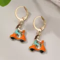 Gold hoop earrings featuring cute enamel orange scooter girl pendant for women daily wear. - Motorcycle Scooter Style