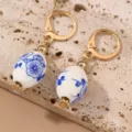 Vintage blue and white porcelain bead earrings with gold-toned leverback hooks, elegant retro style. - Blue And White Pattern-Oval Bead Minimalist (EZ5253lanbai-2)