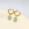 Close-up of stainless steel gold hoop earrings with light green natural stone charms. - Light Green Stone Style (E1962) / 1 Pair Pack