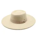 Close-up detail of the elegant beige felt wide-brim fedora hat with a delicate bow ribbon. - One Size / Beige