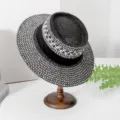 Classic black and white woven fedora straw hat with chic ribbon, perfect for summer sun. - M (55-57cm) / Black
