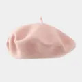 Close-up detail of a soft pink woolen beret, showing the fine texture and classic painter style. - Recommended Head Circumference 56-59 cm (Elastic, Non-adjustable) / Light Pink
