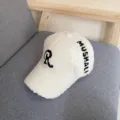 Detail shot of a white fluffy teddy fleece baseball cap with black embroidered letters and cozy texture. - L (58-60cm) / White
