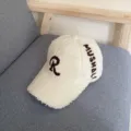 Detailed view of cream lamb wool baseball cap with brown R letter embroidery and side text. - L (58-60cm) / Beige