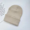 Classic solid color knit beanie hat for autumn and winter, warm and soft pullover hat. - One Size / Beige