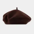 Detailed view of the brown wool beret, showing fine texture and classic vintage painter hat design. - Recommended Head Circumference 56-59 cm (Elastic, Non-adjustable) / Dark Coffee