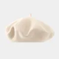 Close-up detail of the soft beige wool beret, showcasing smooth texture and classic top stem. - Recommended Head Circumference 56-59 cm (Elastic, Non-adjustable) / Beige