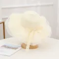 Women chic straw sun hat with mesh brim and sweet lace ribbon bow for summer holiday. - Cream