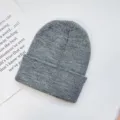 Classic solid color knitted beanie for adults, warm winter pullover hat in grey color. - One Size / Marl Grey
