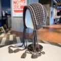 Handmade crochet knit beanie hat with long tassels and earflaps in dark grey color. - One Size / Coffee