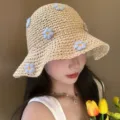 Hand-woven straw sun hat for women featuring blue flower appliques for beach vacation - Woven Small Flower Style / Beige