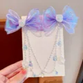 Fermaglio per capelli con fiocco in organza viola e perle conchiglia, accessorio sirena. - Catena da Fronte / Viola