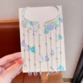 Orecchino cuff conchiglia iridescente sirena bambina, accessorio variante stile principessa. - Gancio per Orecchio / Aurora boreale