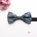 Blue plaid bow tie detail shot showing fabric texture, black strap, and classic pattern. - Poly-Cotton Bow Ties-b