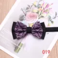 Men's purple paisley bow tie close-up, stylish two-tone design for formal events and weddings. - Color 019