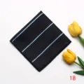 Elegant black jacquard pocket square with blue stripes, perfect for formal business suits. - Style 18