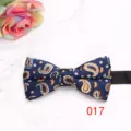 Classic navy blue paisley bow tie for men, elegant wedding suit accessory detail view. - Deep Blue Paisley