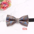 Detailed view of blue paisley pattern men's bow tie with elegant floral design texture. - Blue Orange Gray