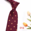 Burgundy floral men's necktie detail, elegant silk tie for business and formal evening wear. - Color 016