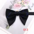 Black cotton bow tie with blue plaid detail, perfect for men's wedding and casual wear. - Color 013