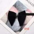 Velvet bow tie detail showing black fabric and sparkling rhinestone center ring for suits. - 010 (Black)