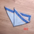 Detail view of men's suit pocket square with blue and beige stripes, folded silk handkerchief. - Color 002