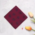 Detail view of a luxury burgundy pocket square featuring unique abstract patterns and fine edges. - Satin Pocket Squares - F
