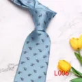Men's light blue helicopter print tie detail shot, elegant fabric texture and design. - Light Blue Helicopter (L006)