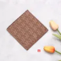 Pocket square detail close-up showing intricate brown leaf pattern design, elegant suit accessory. - Satin Pocket Squares - M