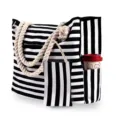 Detailed view of black and white striped canvas beach bag with rope handles and side pocket - With Inner Pouch Style / Black & White Stripes