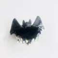 Glittery black bat hair claw clip with silver teeth for Halloween. - Black