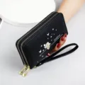 Schwarze lange Damen-Geldbörse mit Doppelreißverschluss, Blumen-Vogel-Print und Schlaufe - Schwarz