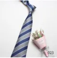 Detail shot of a classic blue and grey striped necktie, elegant accessory for business. - Color 023