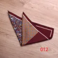 Detailed shot of a printed silk pocket square with paisley and geometric patterns, ideal accessory. - 012