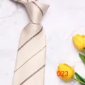 Detail view of classic men's fine striped silk necktie in light beige for business wear. - No. 023 - Light Diagonal Weave