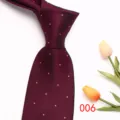 Burgundy men's business tie with subtle orange polka dots, elegant product detail view. - Burgundy Polka Dot (006)