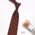 Brown men's business suit necktie with white square pattern, elegant formal wear accessory. - Color 011