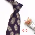Detail of dark purple feather jacquard tie, elegant silk texture design for men's formal suit. - No.010 Deep Purple Silver Feather