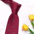 Burgundy silk tie with white whale pattern, elegant business formal necktie for men detail view. - Style Q